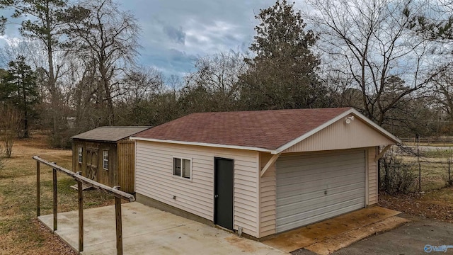 6670 Moores Mill Rd, Huntsville, AL 35811 - detached garage featuring fence