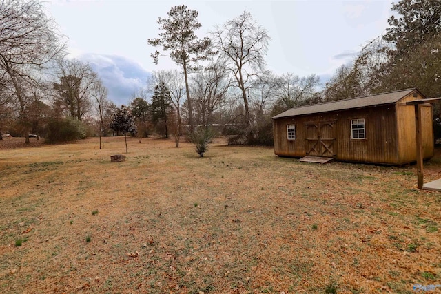 6670 Moores Mill Rd, Huntsville, AL 35811 - view of yard with a storage shed and an outdoor structure