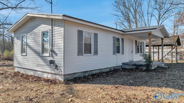 view of home's exterior featuring covered porch