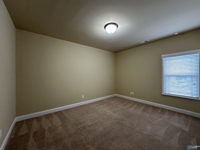 view of carpeted spare room