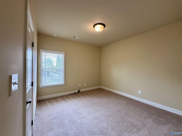 view of carpeted spare room