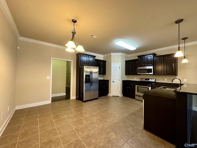 kitchen featuring appliances with stainless steel finishes, ornamental molding, sink, light tile patterned floors, and hanging light fixtures