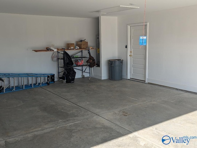 garage featuring baseboards