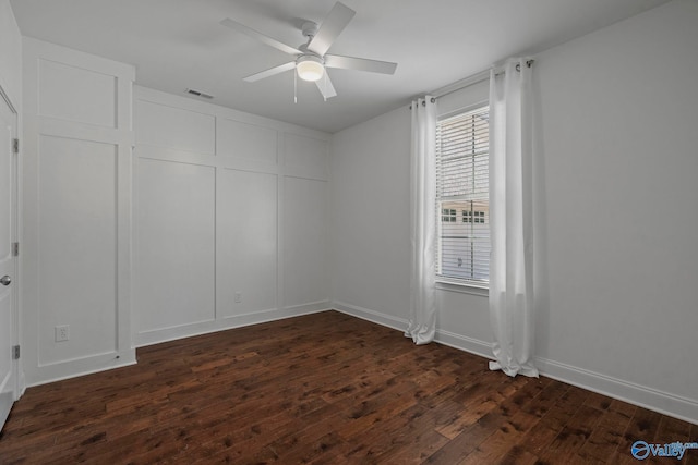 51 Summerlyn Way SE, Gurley, AL 35748 - unfurnished room featuring dark wood-style floors, ceiling fan, and baseboards