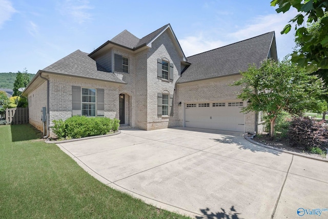 51 Summerlyn Way SE, Gurley, AL 35748 - french provincial home with brick siding, roof with shingles, driveway, a garage, and a front yard