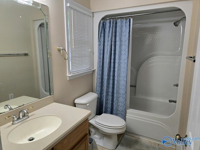 full bathroom with vanity, toilet, and shower / bath combination with curtain