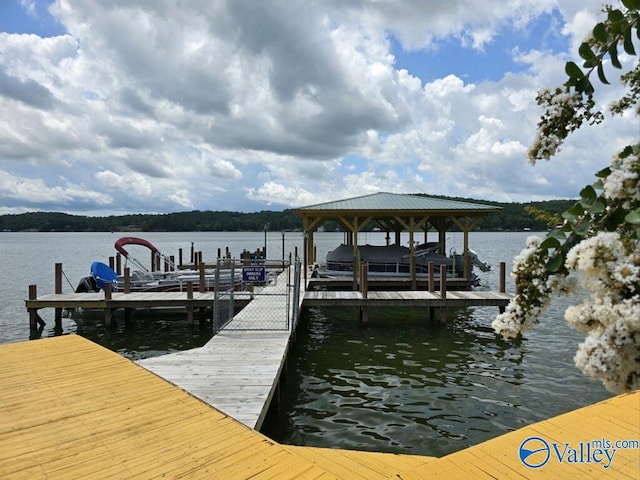 view of dock featuring a water view