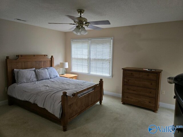 662 County Road 662 Unit 1, Cedar Bluff, AL 35959 - bedroom featuring light colored carpet, baseboards, visible vents, and a textured ceiling