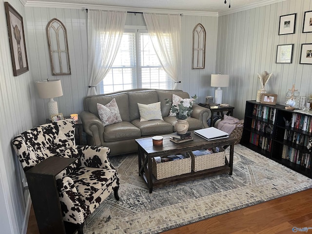 living room with crown molding and wood-type flooring