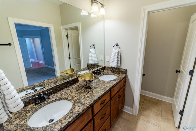 bathroom featuring vanity and tile patterned flooring