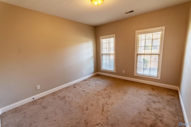 view of carpeted spare room