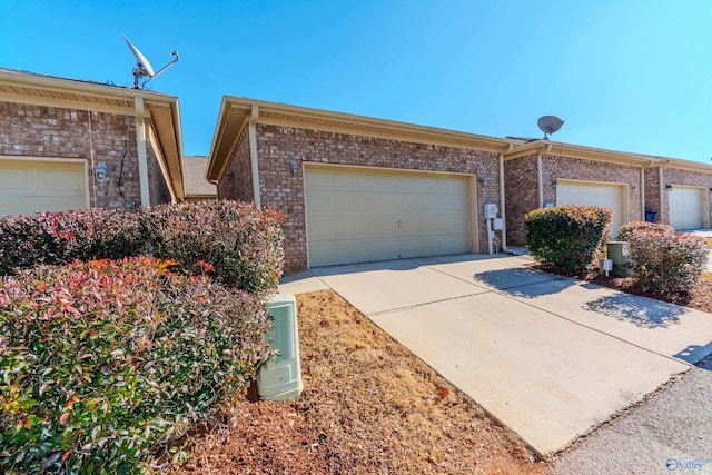 ranch-style home featuring a garage