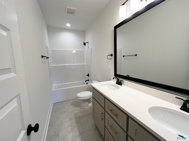 full bathroom with  shower combination, toilet, tile patterned flooring, and vanity