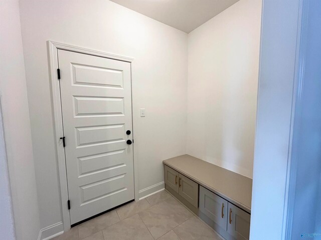 mudroom featuring light tile patterned flooring