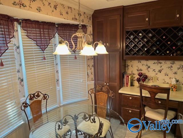 dining room featuring ornamental molding