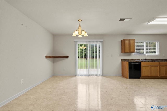 kitchen with a chandelier, plenty of natural light, hanging light fixtures, and black dishwasher