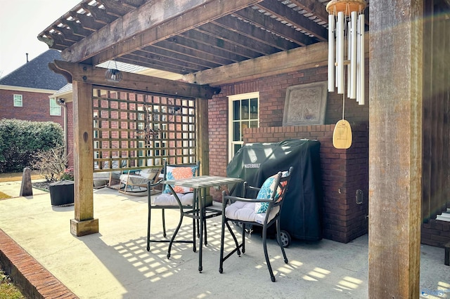 view of patio featuring a pergola