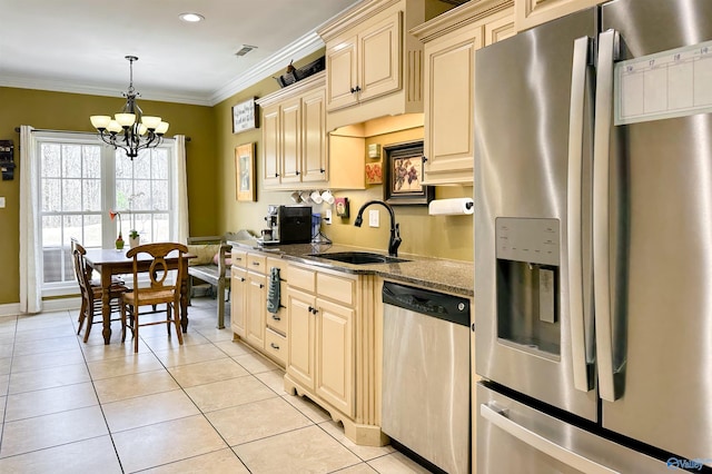 kitchen featuring stainless steel appliances, sink, light stone counters, light tile patterned floors, and crown molding
