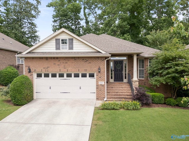 6807 Breyerton Way SE, Owens Cross Roads, AL 35763 - view of front of property with a front yard, concrete driveway, an attached garage, and brick siding