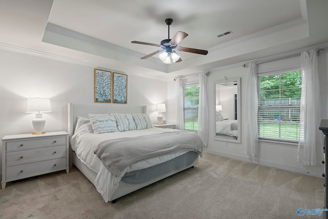 6807 Breyerton Way SE, Owens Cross Roads, AL 35763 - bedroom featuring a raised ceiling, crown molding, light carpet, and a ceiling fan