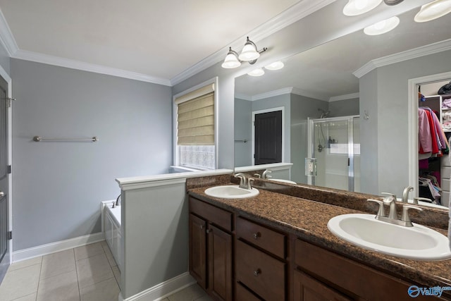 6807 Breyerton Way SE, Owens Cross Roads, AL 35763 - full bath with a stall shower, double vanity, a bath, tile patterned flooring, and baseboards