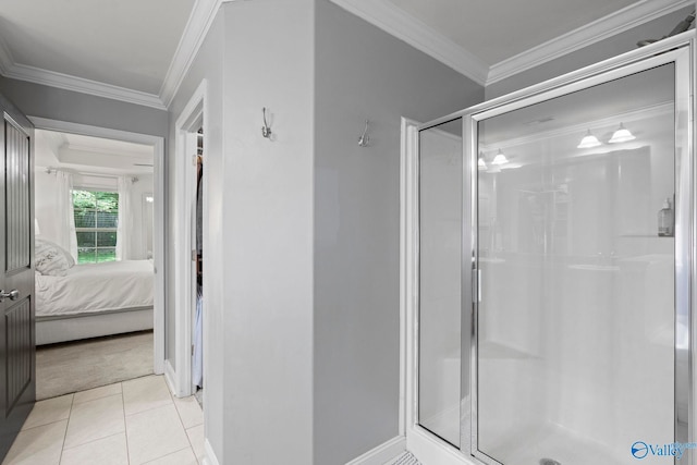 6807 Breyerton Way SE, Owens Cross Roads, AL 35763 - ensuite bathroom featuring a stall shower, crown molding, tile patterned flooring, and baseboards