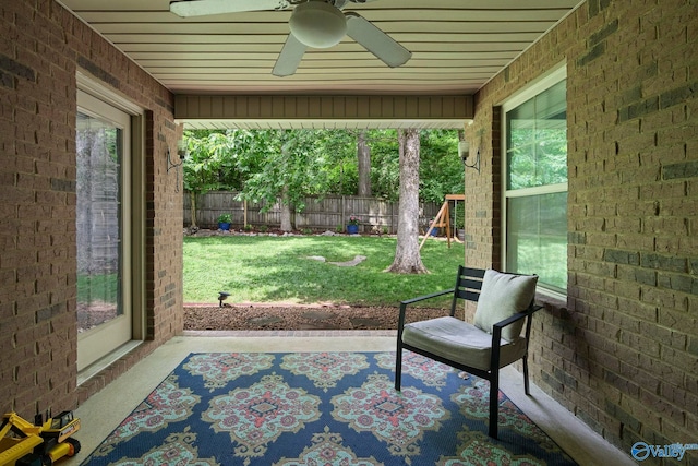 6807 Breyerton Way SE, Owens Cross Roads, AL 35763 - sunroom with a ceiling fan and plenty of natural light