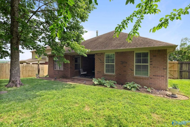 6807 Breyerton Way SE, Owens Cross Roads, AL 35763 - back of property with roof with shingles and brick siding