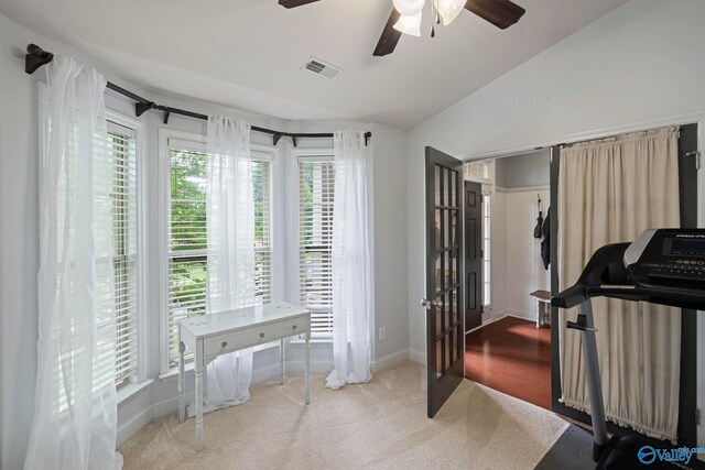 6807 Breyerton Way SE, Owens Cross Roads, AL 35763 - workout room with a ceiling fan, carpet flooring, baseboards, vaulted ceiling, and french doors