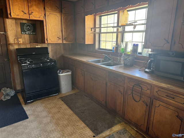 kitchen with sink and black range with gas stovetop