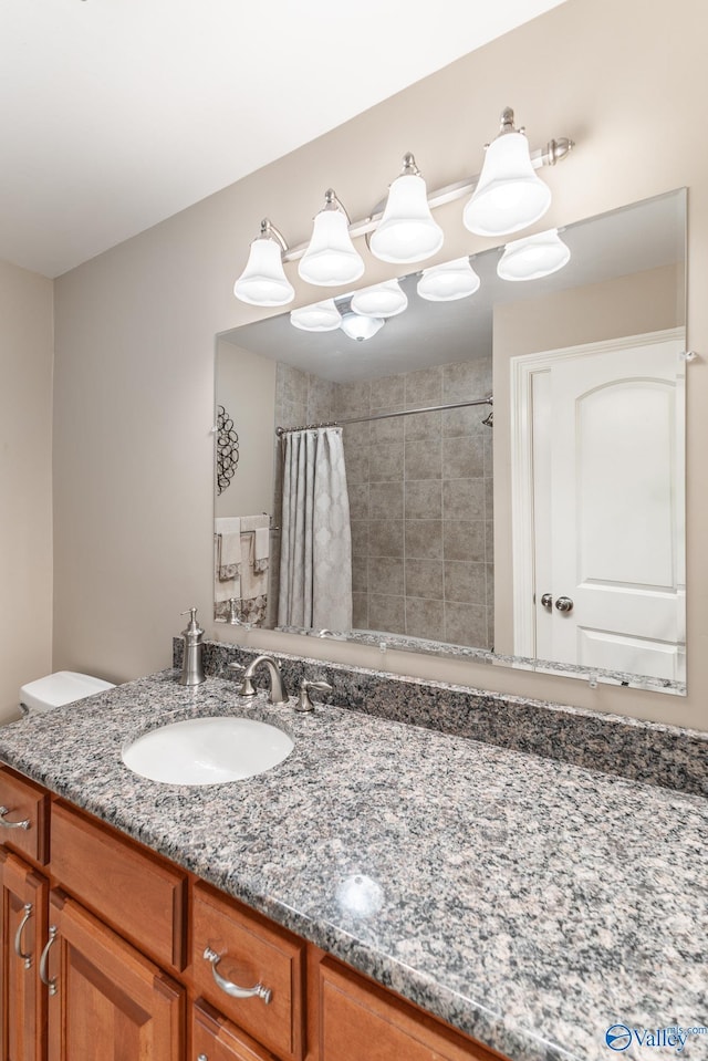 406 Zandale Dr SW, Huntsville, AL 35801 - bathroom featuring vanity and tiled shower