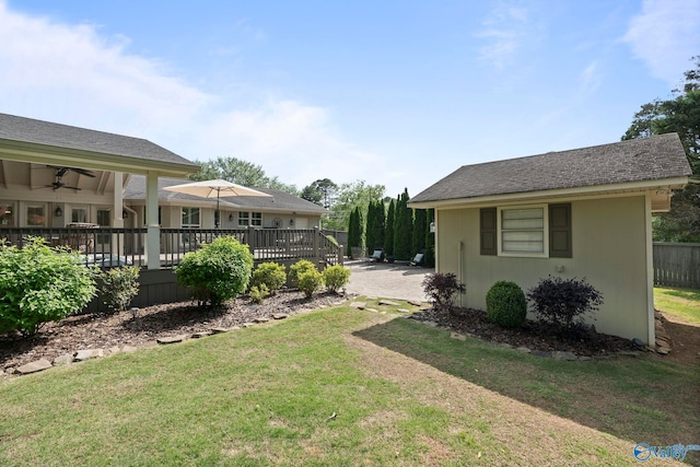 406 Zandale Dr SW, Huntsville, AL 35801 - view of grassy yard featuring a wooden deck, a patio area, and ceiling fan