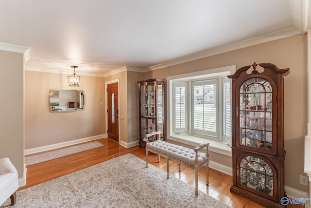 406 Zandale Dr SW, Huntsville, AL 35801 - foyer entrance with wood finished floors, ornamental molding, baseboards, and a chandelier
