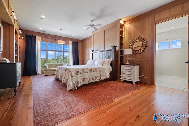 bedroom with light wood-style flooring and recessed lighting