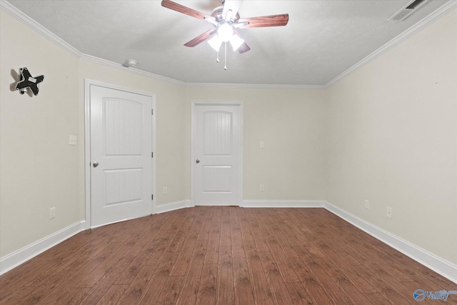 unfurnished room featuring wood-type flooring, ornamental molding, and ceiling fan