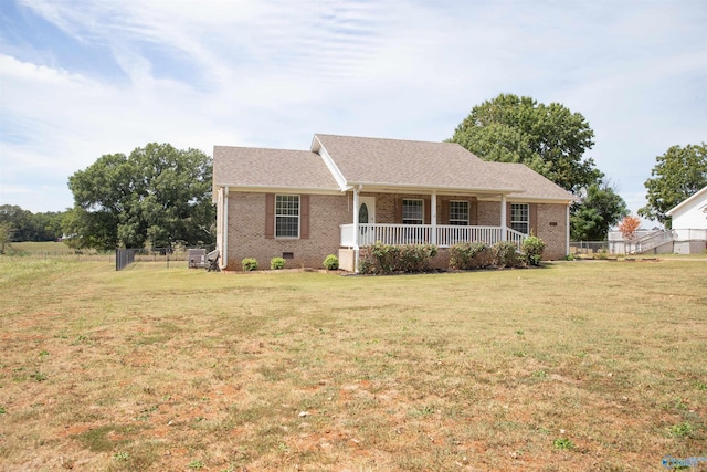 ranch-style house featuring crawl space, covered porch, fence, a front yard, and brick siding