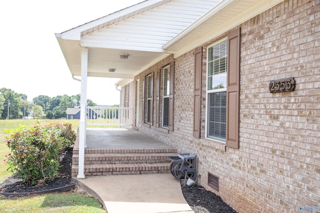 view of patio featuring a porch