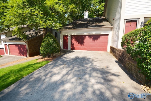 garage with driveway