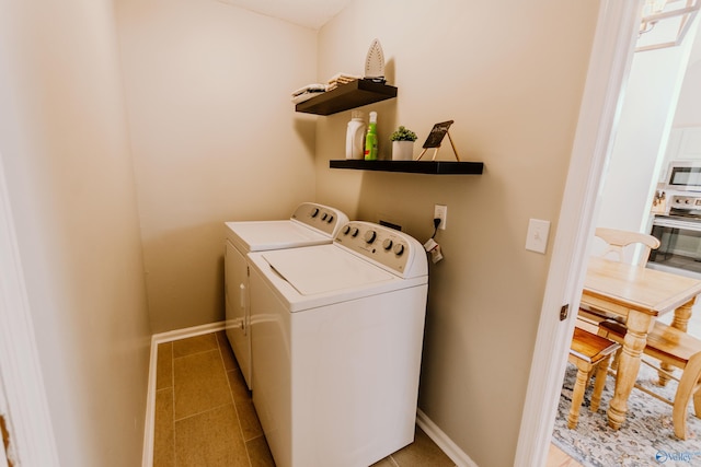 washroom featuring separate washer and dryer