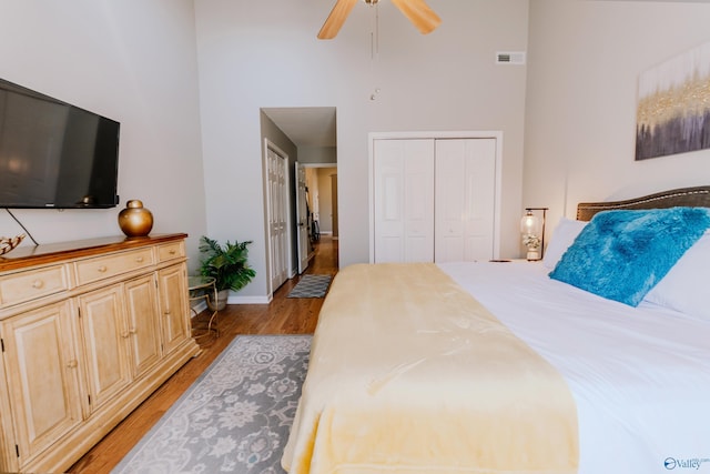 bedroom featuring ceiling fan and light hardwood / wood-style floors