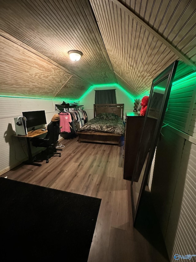 interior space with wooden ceiling, vaulted ceiling, and wood-type flooring