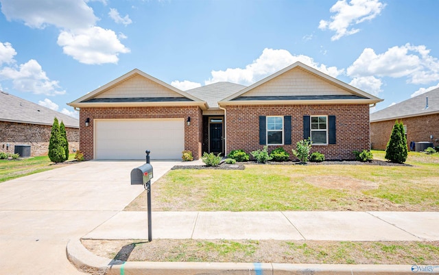 ranch-style home with a front lawn, a garage, and brick siding