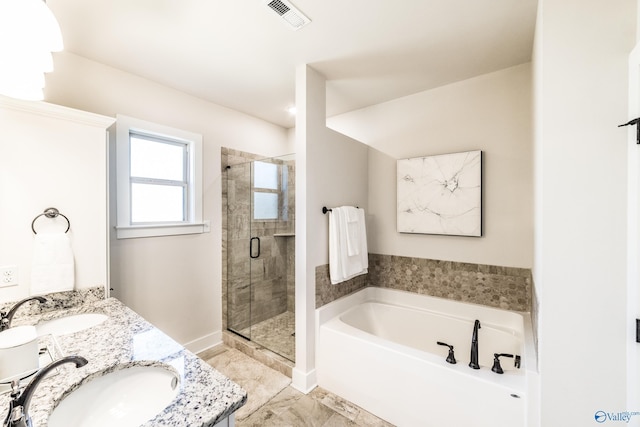 bathroom featuring plus walk in shower and vanity