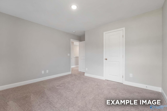 unfurnished bedroom featuring carpet flooring