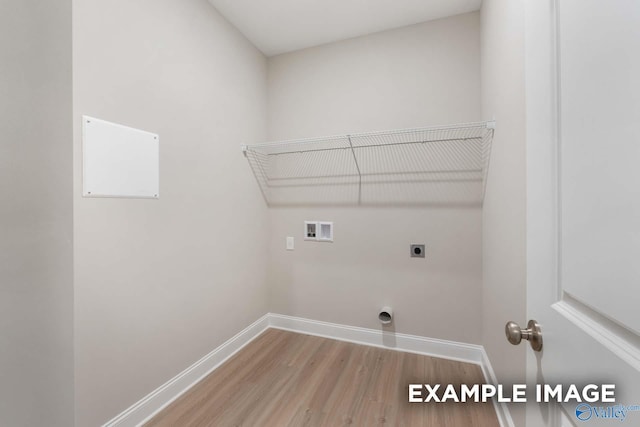 laundry room with electric dryer hookup, washer hookup, and hardwood / wood-style flooring