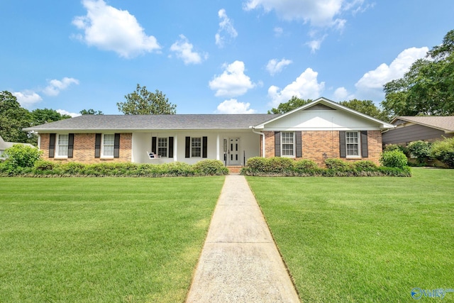 708 Apache St NW, Hartselle, AL 35640 - single story home with brick siding and a front lawn