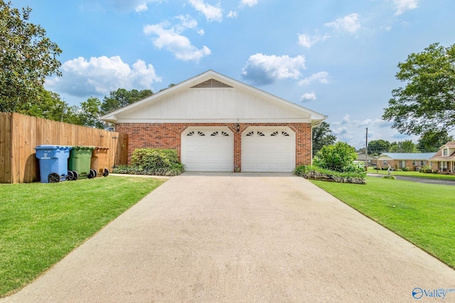 708 Apache St NW, Hartselle, AL 35640 - ranch-style house with brick siding, driveway, and a garage