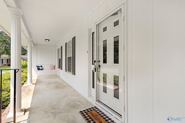 708 Apache St NW, Hartselle, AL 35640 - view of exterior entry featuring a porch