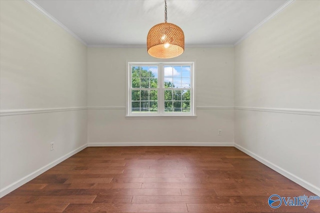 304 Ohara Dr, Albertville, AL 35950 - spare room featuring ornamental molding, hardwood / wood-style floors, and baseboards