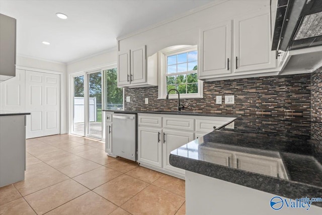 304 Ohara Dr, Albertville, AL 35950 - kitchen with dishwasher, a sink, healthy amount of natural light, light tile patterned flooring, and ornamental molding